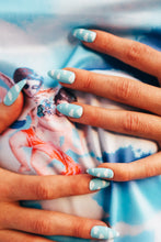 Load image into Gallery viewer, two hands wearing stiletto shaped press on nails with light blue and white clouds